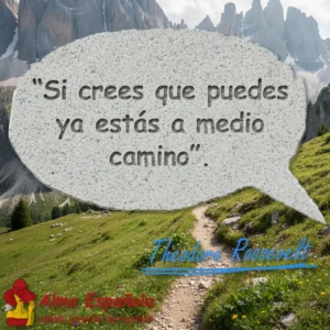 Hiszpański cytat motywacyjny Theodore'a Roosevelta: 'Si crees que puedes ya estás a medio camino', na tle górskiej ścieżki.